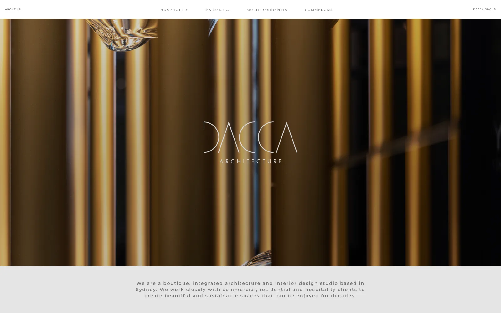 DACCA Architecture website home page with a gold architectural image